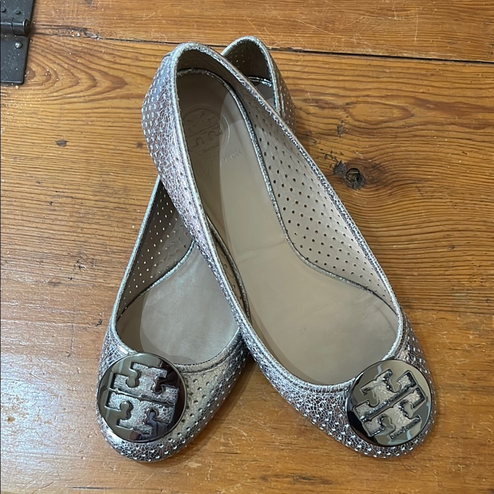 Tory Burch Silver Flats with Medallion Embellishment.